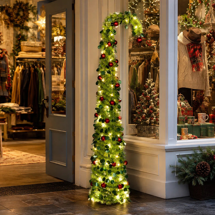 Groene pop-up kerstboom met rode ballen