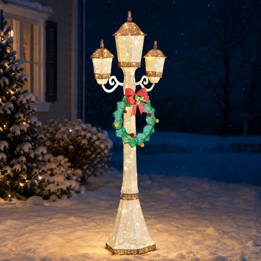 Gouden kerstlantaarnpaal met krans