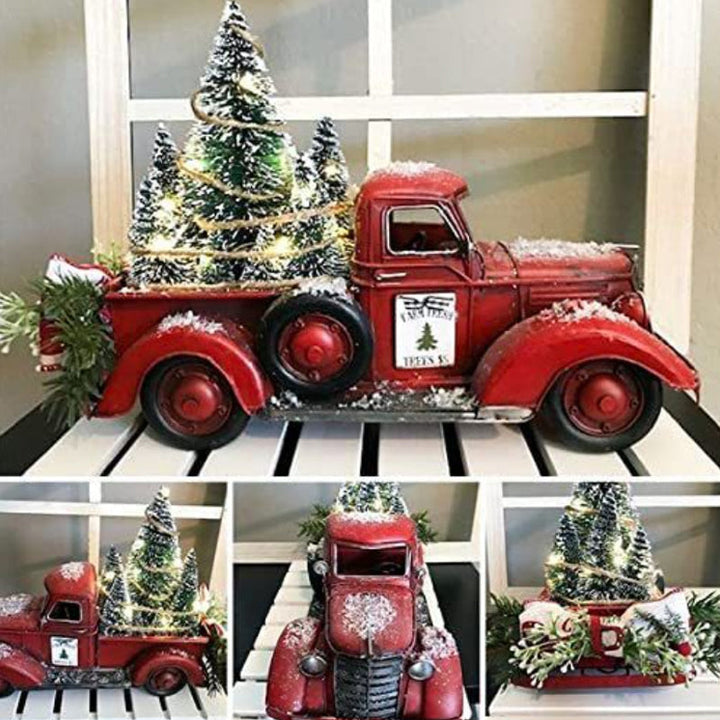 Rode boerderijtruck met kerstbomen en losse kerstboom