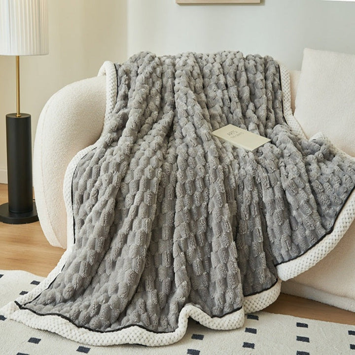 Zachte plaid met bubbelstructuur, licht als een wolkje