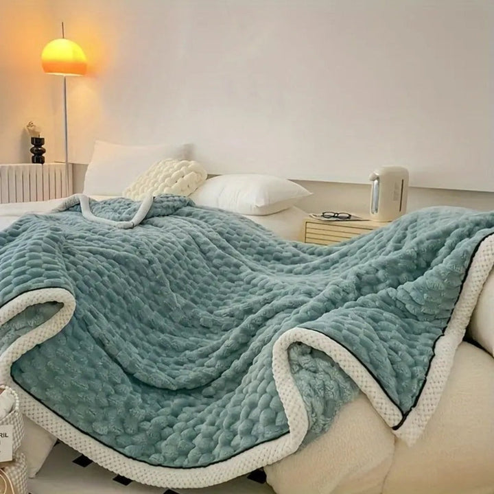 Zachte plaid met bubbelstructuur, licht als een wolkje