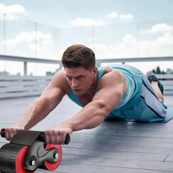 Buikspierwiel met dubbele veerterugslag en telefoonhouder