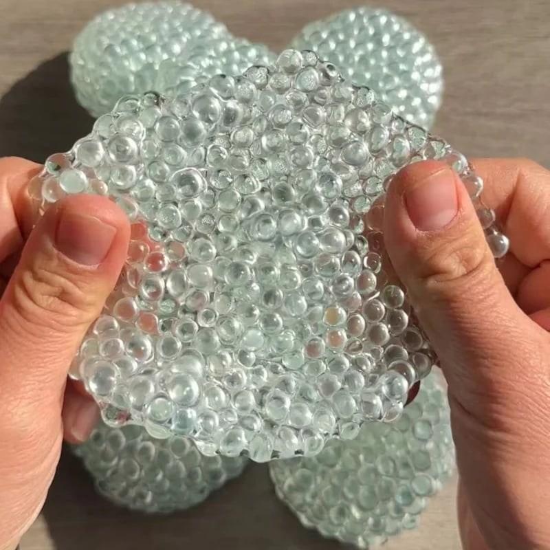 Hollevo™ Squishy stressbal in dumplingvorm met gelbolletjes
