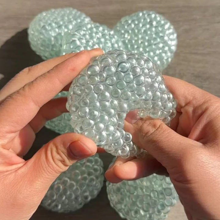 Hollevo™ Squishy stressbal in dumplingvorm met gelbolletjes